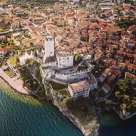 Gaia Con Piscina Seeblick Апартаменты Мальчезине